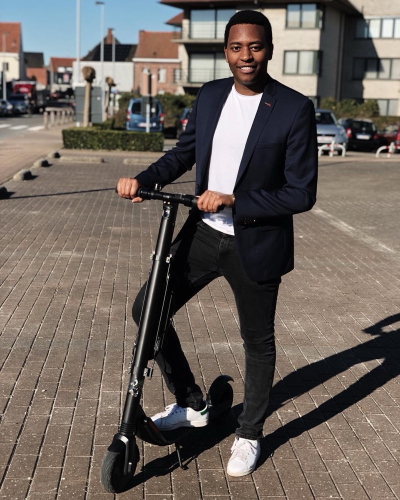 Constantin Vermoere with an electric kick scooter, Freel